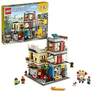 LEGO Creator 3 in 1 Townhouse Pet Shop & Caf 31097 Toy Store Building Set with Bank, Town Playset with a Toy Tram, Animal Figures and Minifigures (969 Pieces)