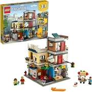 LEGO Creator 3 in 1 Townhouse Pet Shop & Caf 31097 Toy Store Building Set with Bank, Town Playset with a Toy Tram, Animal Figures and Minifigures (969 Pieces) - Standard Packaging