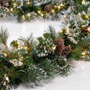National Tree 9' x 10" Glitter Pine Garland with Cones, Snowflakes and 100 Clear Lights