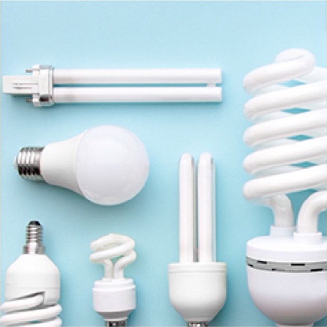 LED, Halogen, Flourescent and CFL light bulbs on a blue background. Links to where to buys light bulbs on dxfairmall.com